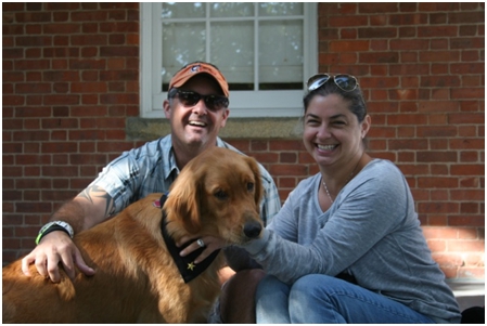 Kevin and his wife Lisa with their service dog, Bella.